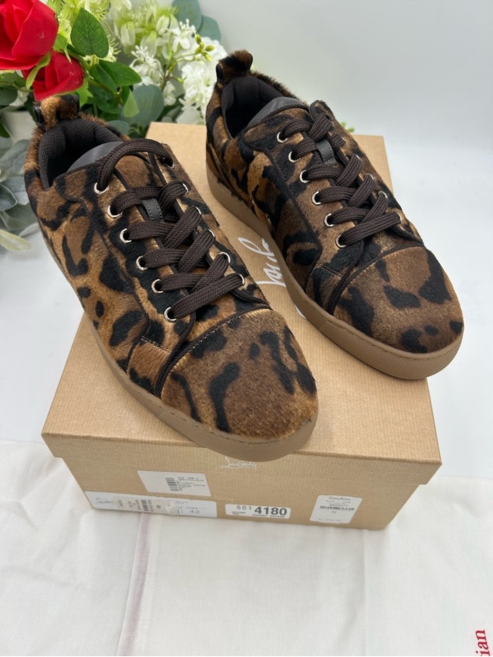 Men’s Christian Louboutin, Louis Jr leopard affect low top sneakers size 42/9 US